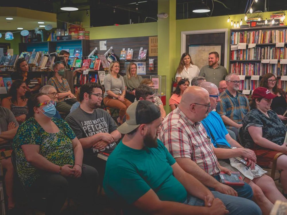 Readers gathered closely together for the author event at Prologue Bookshop