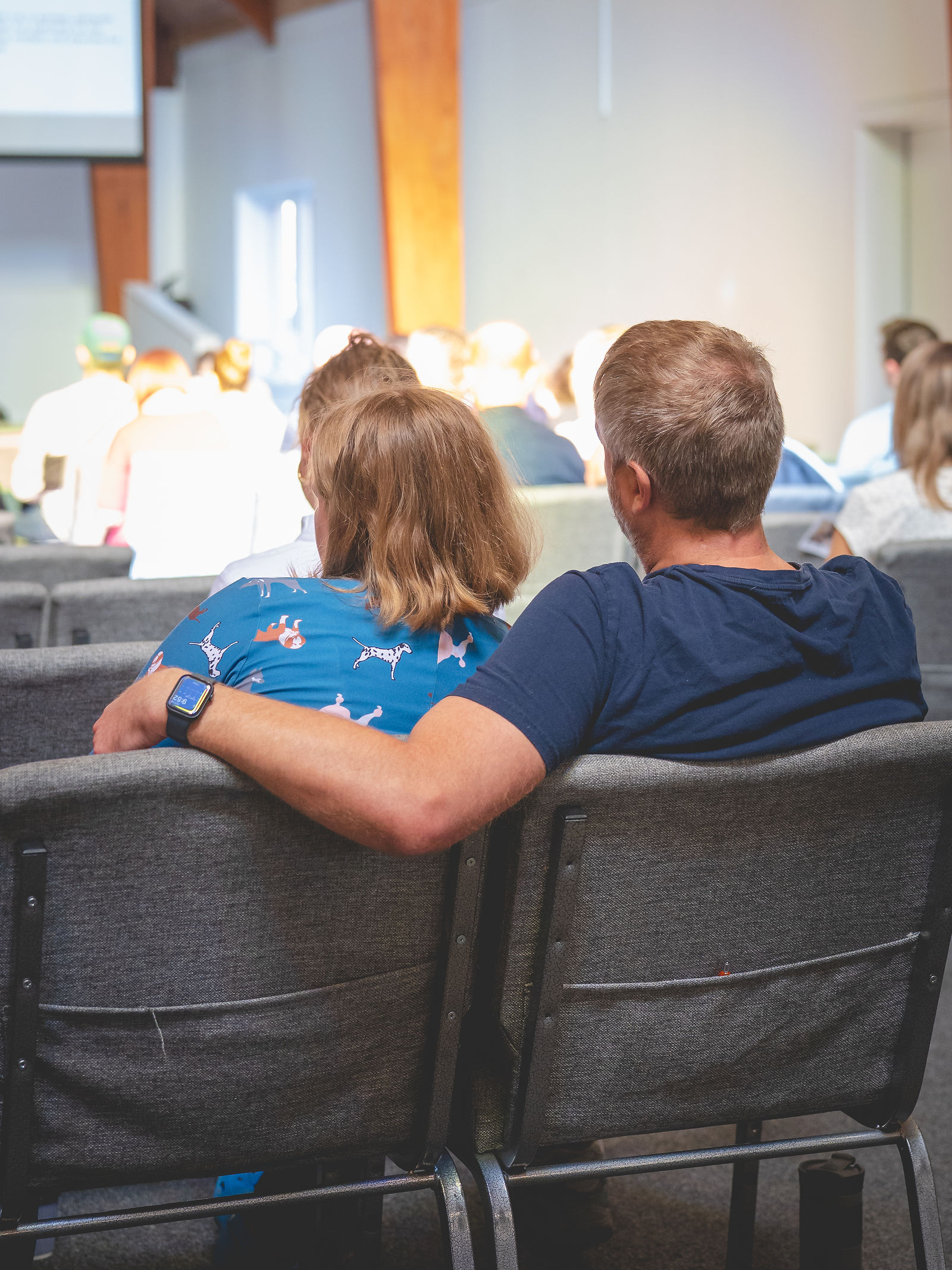 A couple sitting together during a Sanctuary Columbus service
