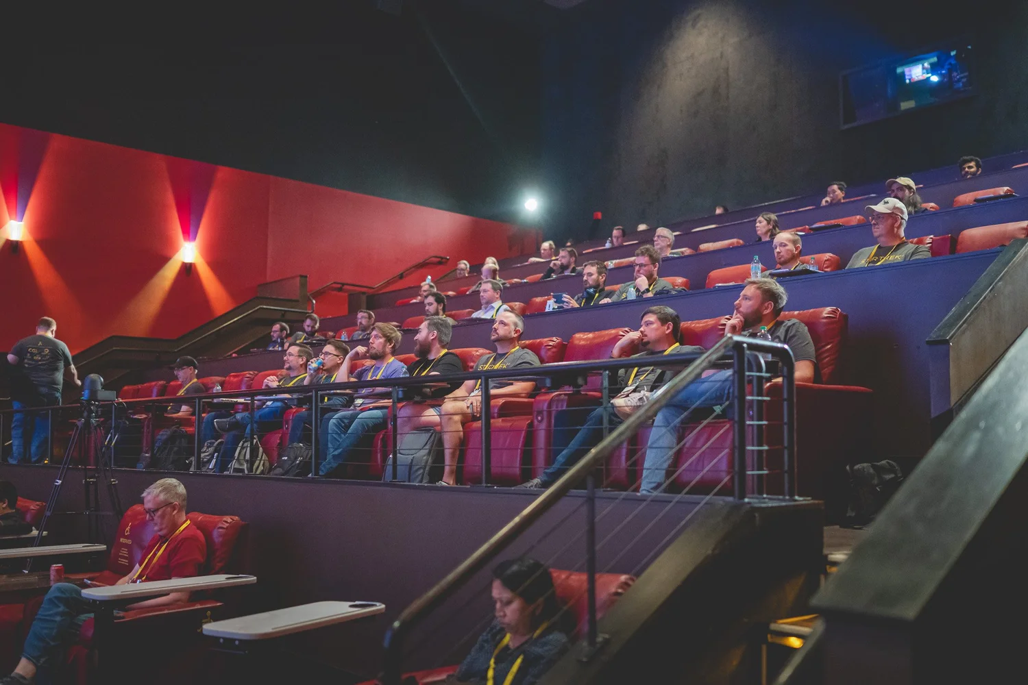 A theater audience focused on a Stir Trek presentation